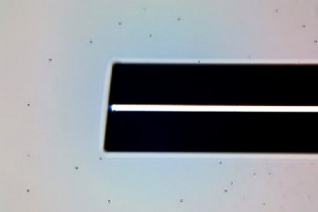 Oblique End-Face Lensed Fibers